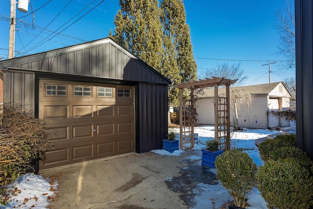 view of snow covered garage