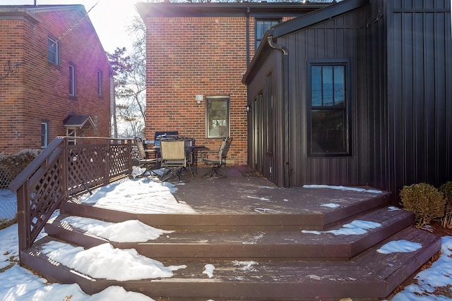 view of snow covered deck