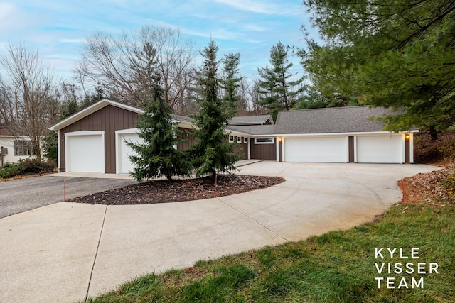 single story home featuring a garage