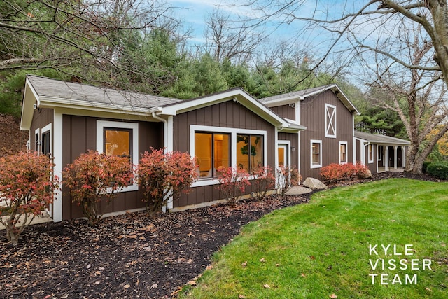 exterior space featuring a front lawn