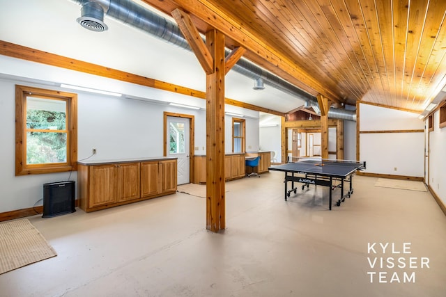 recreation room with wood ceiling and vaulted ceiling with beams