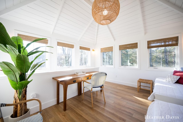 office with lofted ceiling with beams, light hardwood / wood-style floors, and wooden ceiling