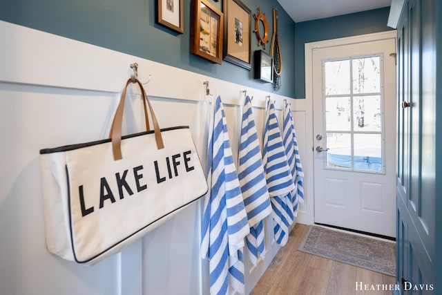 entryway with hardwood / wood-style floors