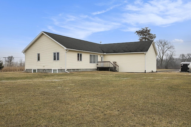 back of house featuring a yard