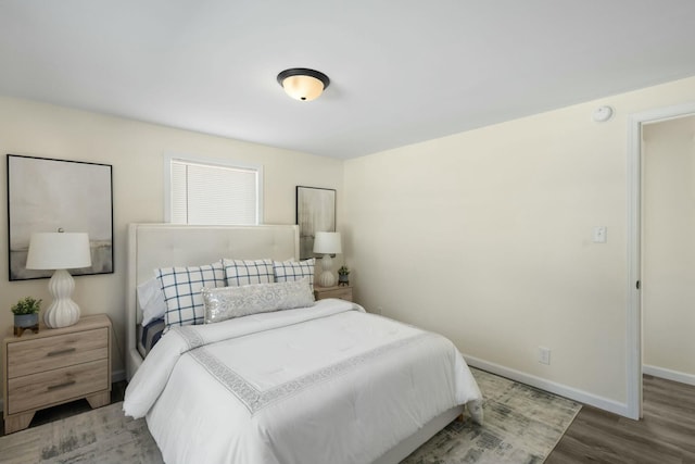 bedroom featuring wood-type flooring