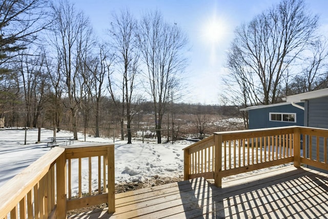 view of snow covered deck