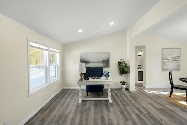 office space with hardwood / wood-style flooring and lofted ceiling