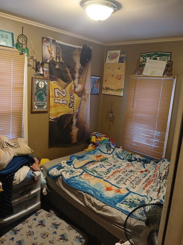 bedroom with ornamental molding