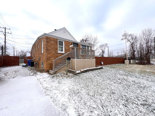 view of snow covered house