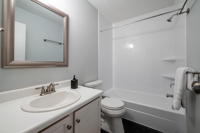 full bathroom with vanity, bathtub / shower combination, and toilet