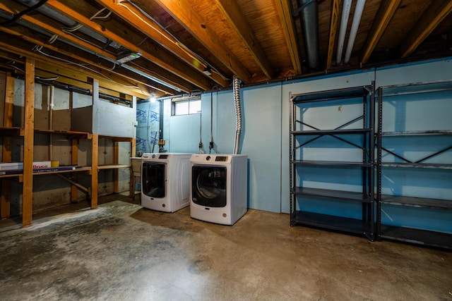 basement with washing machine and dryer