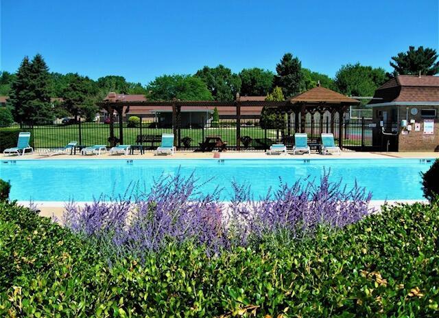 view of swimming pool featuring a gazebo