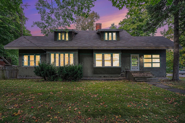 view of front facade with a yard