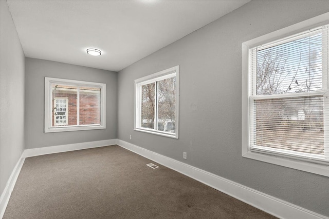 view of carpeted spare room