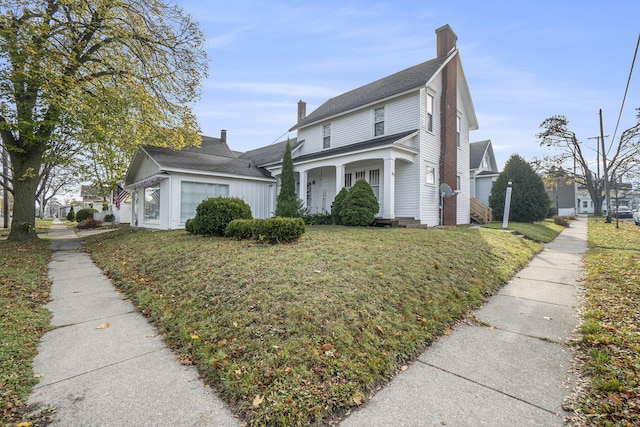 view of front of home with a front lawn