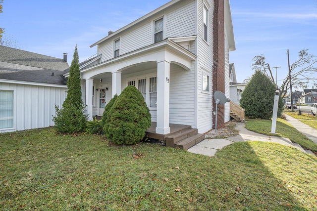 view of front of home with a front yard