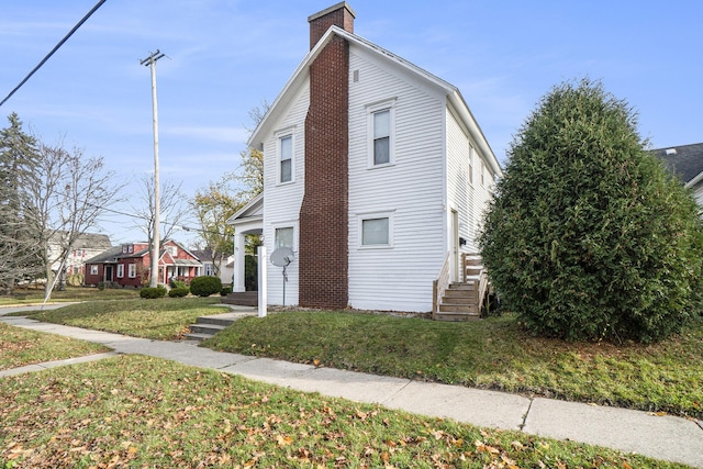 exterior space with a yard