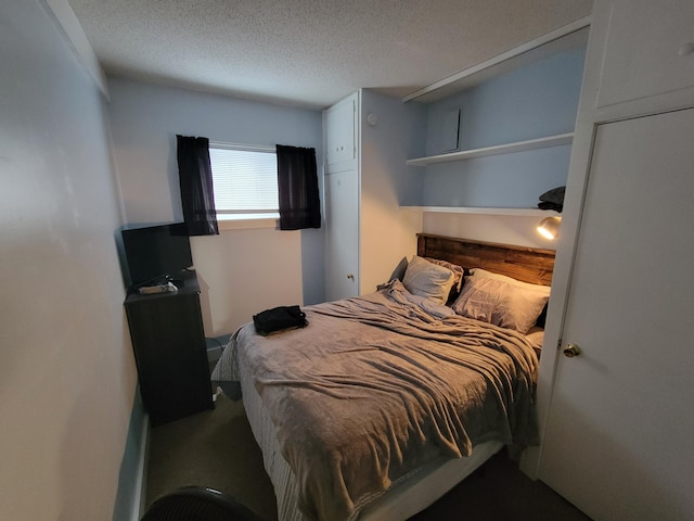 bedroom with a textured ceiling