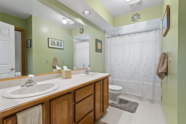 bathroom with vanity, a shower with curtain, tile patterned floors, and toilet