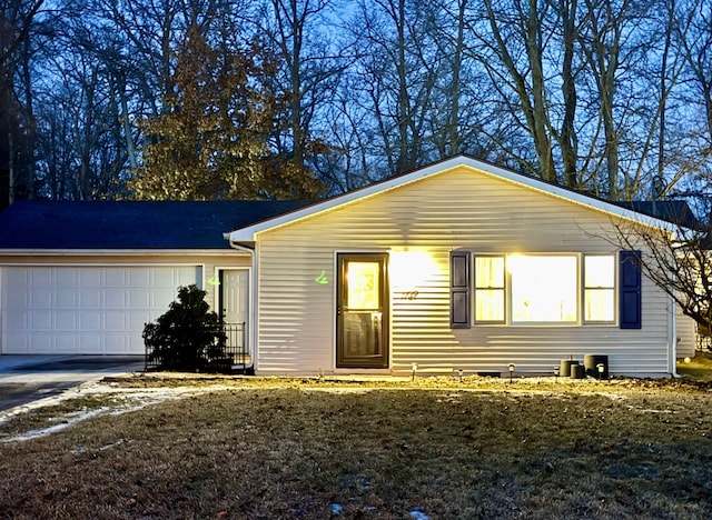 ranch-style home with a garage