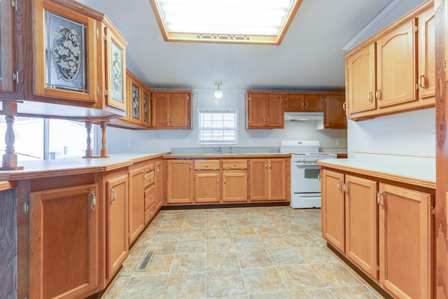 kitchen featuring white range and sink