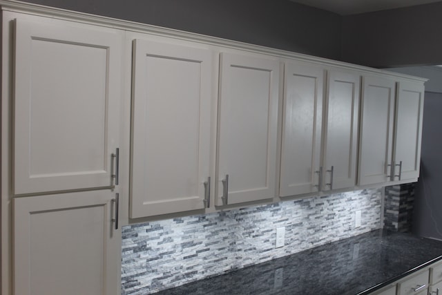 details with backsplash and white cabinets