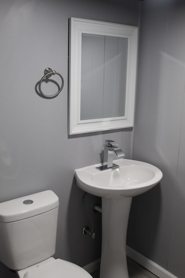 bathroom featuring toilet