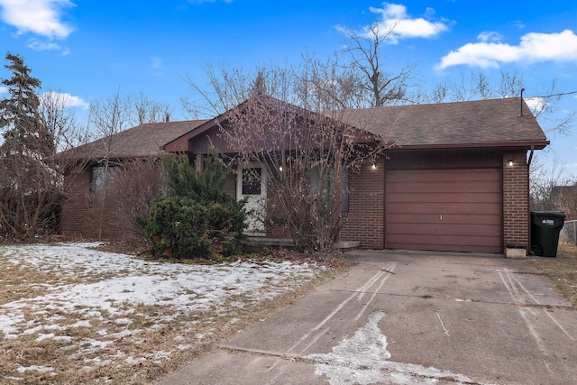 single story home featuring a garage