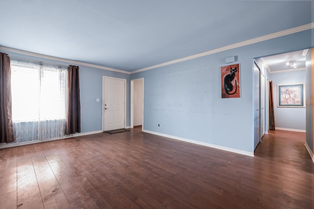 unfurnished room with crown molding and dark wood-type flooring