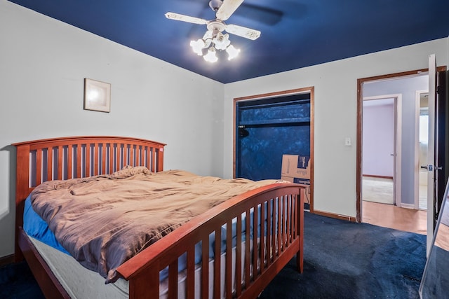 carpeted bedroom featuring ceiling fan