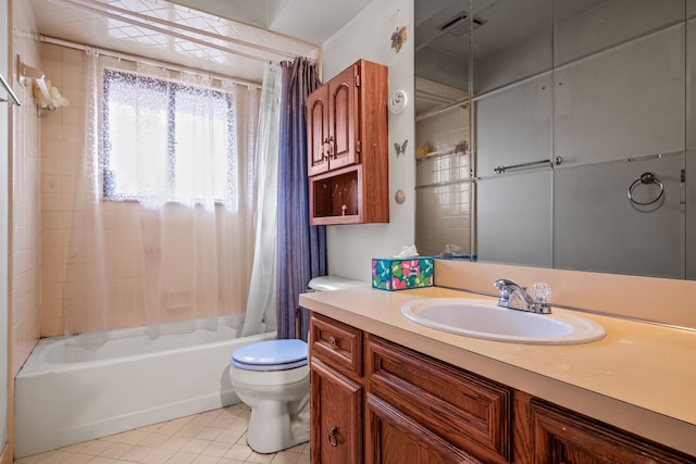 full bathroom with shower / bathtub combination with curtain, vanity, toilet, and tile patterned floors