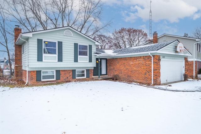 split level home with a garage