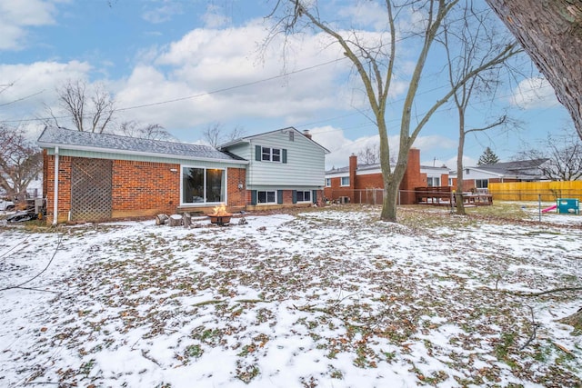 view of snow covered property