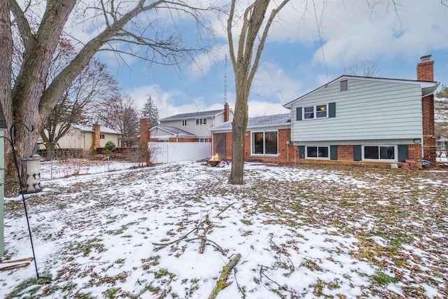 view of snow covered property