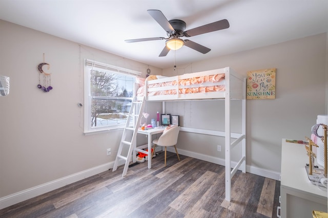 bedroom with dark wood-type flooring and ceiling fan