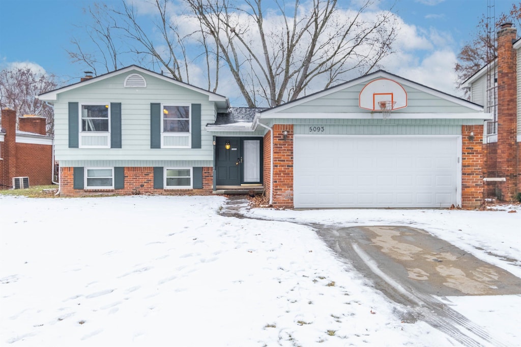 tri-level home featuring a garage