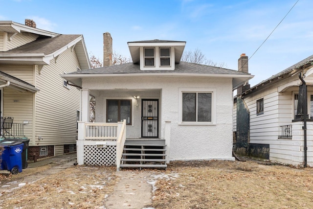 bungalow-style home featuring a porch