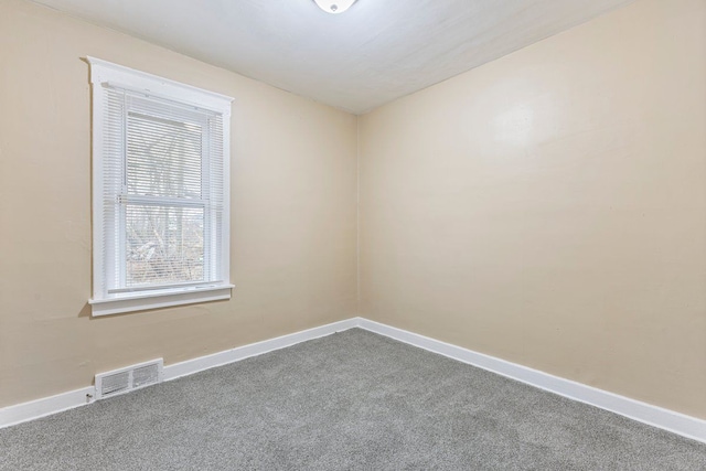 spare room with carpet flooring