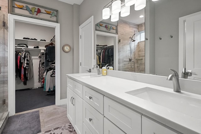 bathroom featuring vanity and walk in shower