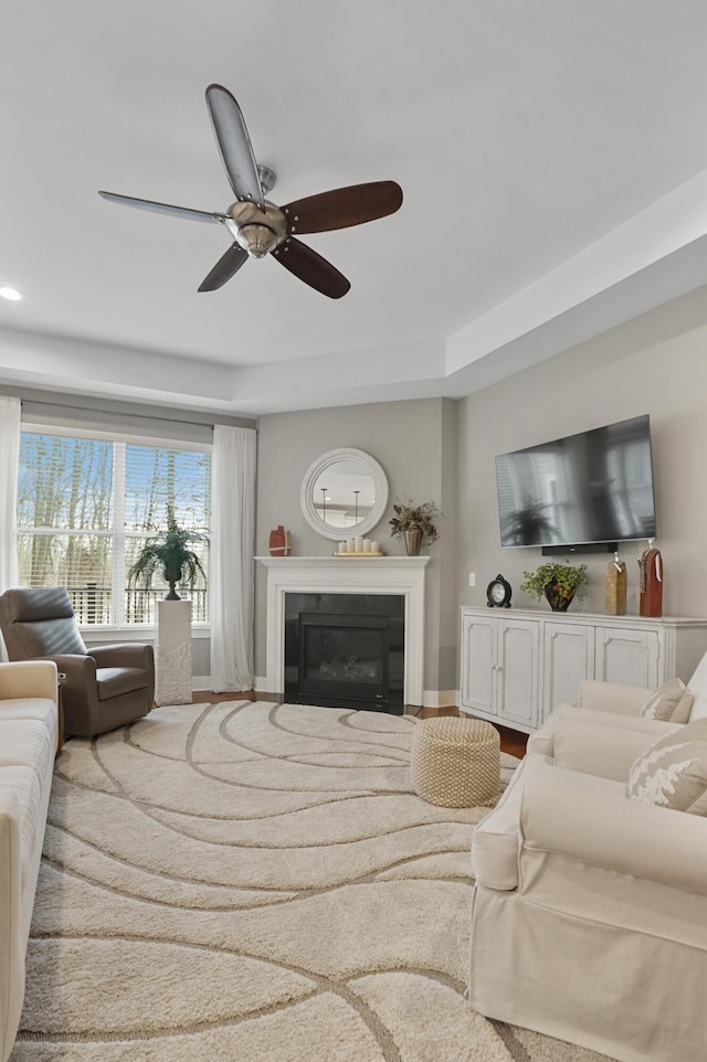 living room featuring ceiling fan