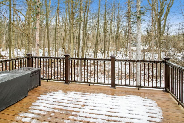 view of snow covered deck