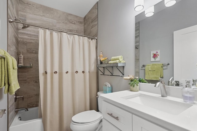 full bathroom featuring vanity, shower / bath combination with curtain, and toilet