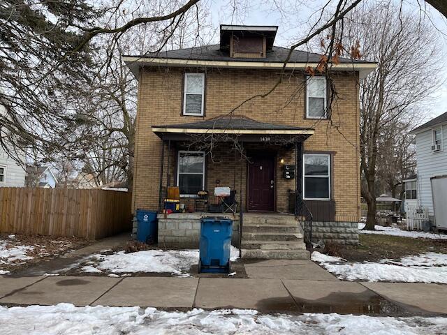 front of property featuring covered porch