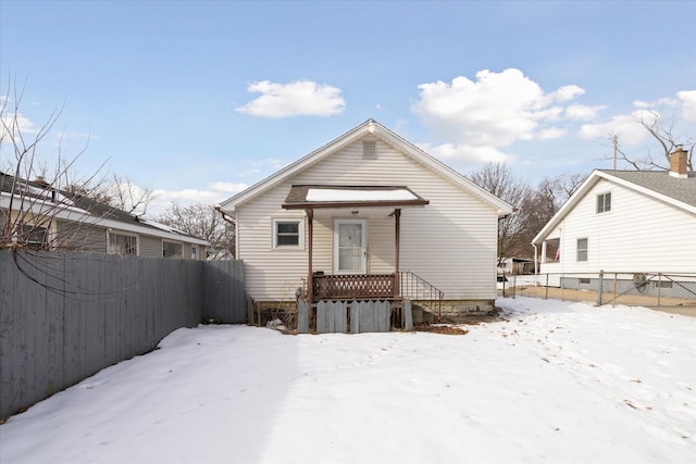 view of snow covered house