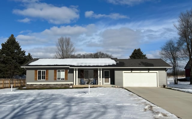 ranch-style house featuring a garage