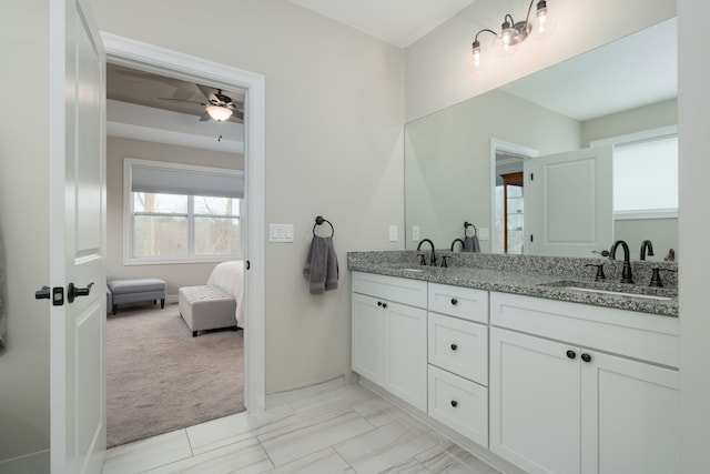 bathroom with vanity and ceiling fan