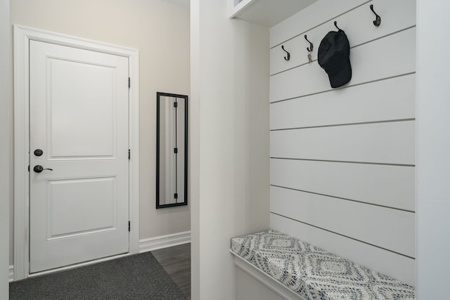 mudroom with dark hardwood / wood-style floors