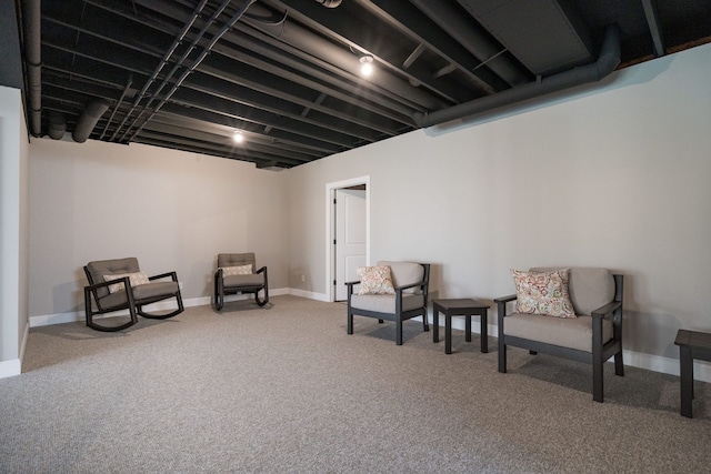 sitting room with carpet flooring