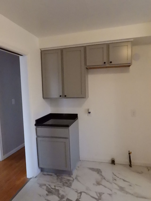 kitchen with gray cabinetry