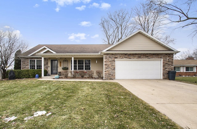 ranch-style home with a garage and a front lawn